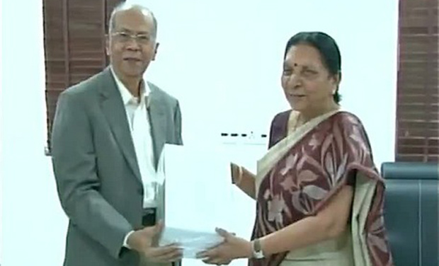 Justice GT Nanavati submits his commission report on 2002 Gujarat riots to CM Anandiben Patel (Photo: Twitter) Justice GT Nanavati submits his commission report on 2002 Gujarat riots to CM Anandiben Patel (Photo: Twitter)